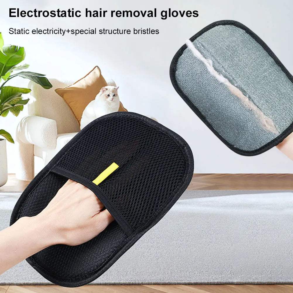 Black electrostatic hair removal glove with a close-up of bristles, used on a person's hand, with a cat and indoor setting in the background.

