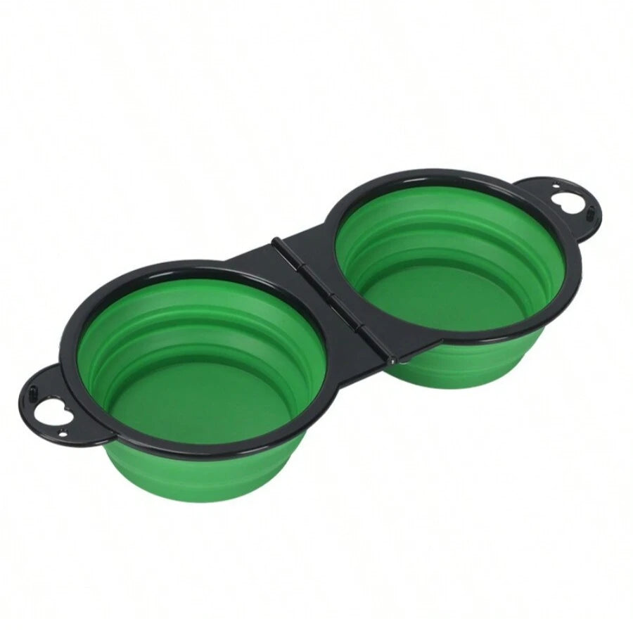 Green and black collapsible pet bowls on a white background

