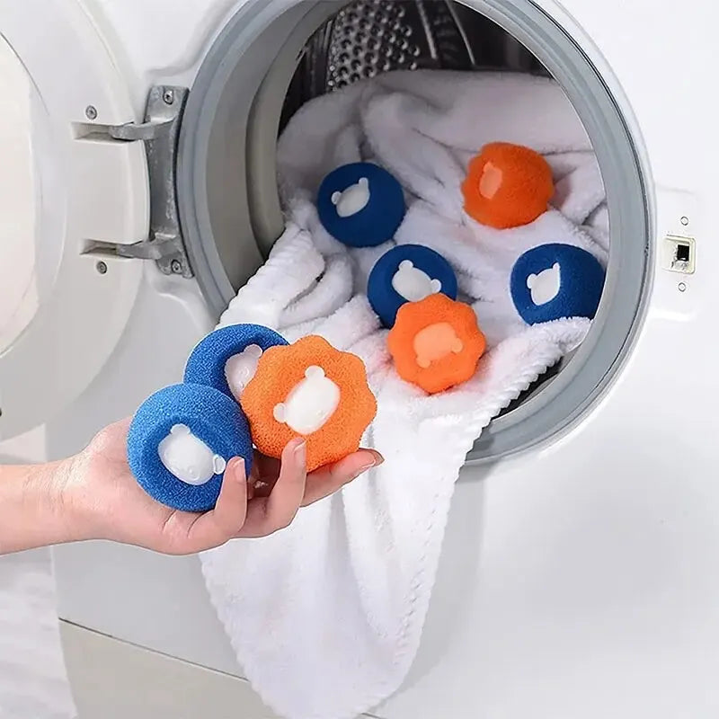 holding pet hair hair removal balls in hand after taking them out from washing machine