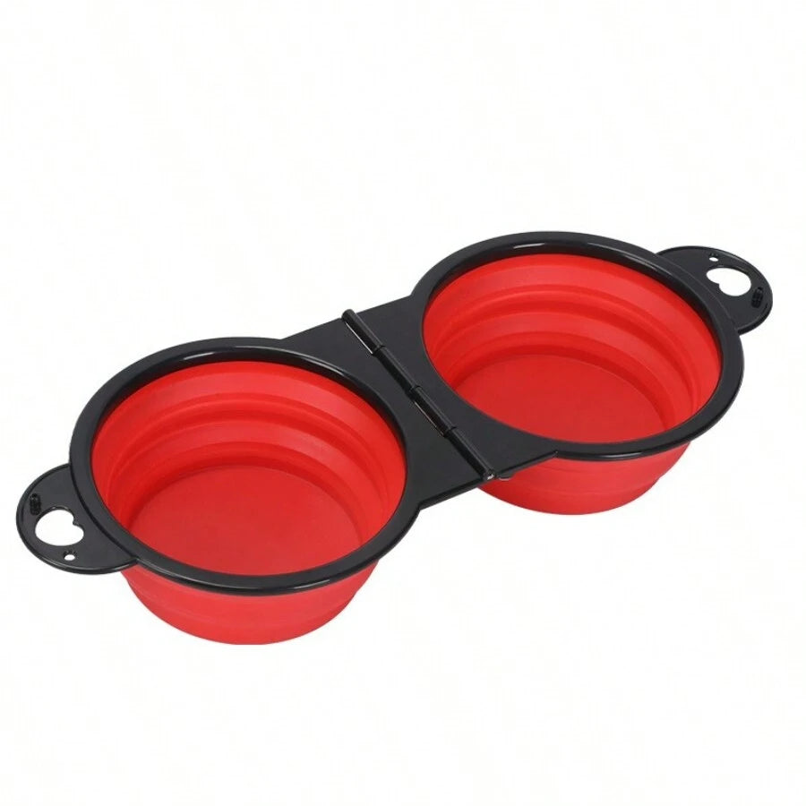 Red silicone pet bowls with black holder on a white background

