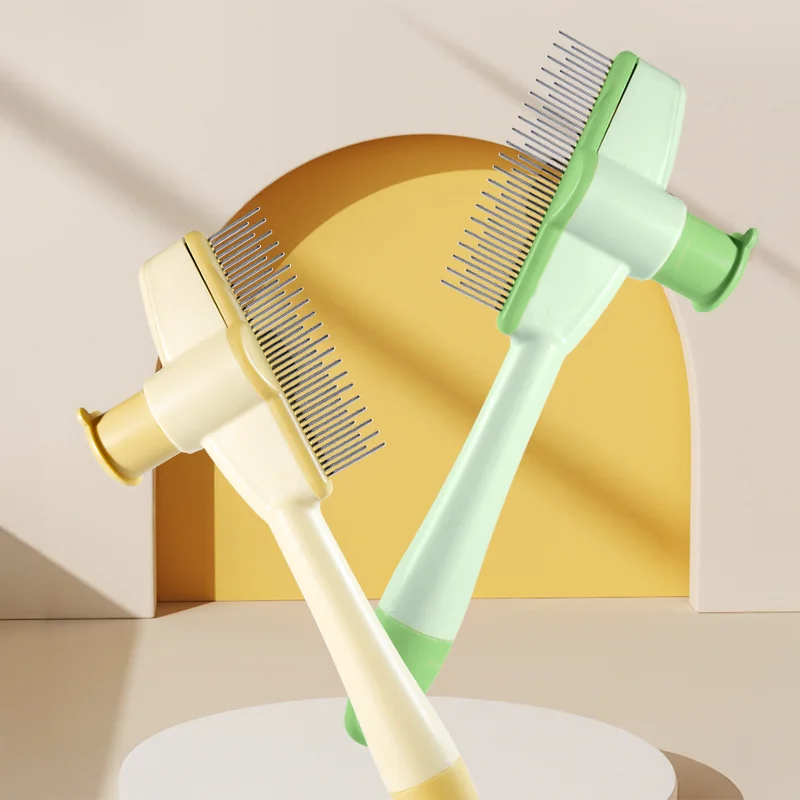 Two pet grooming brushes, one beige and one green, on a neutral background.