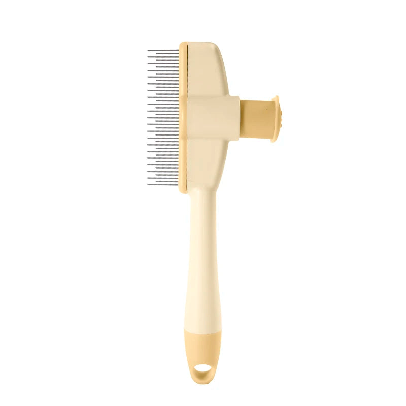 yellow pet grooming brush with gold handle on a white background

